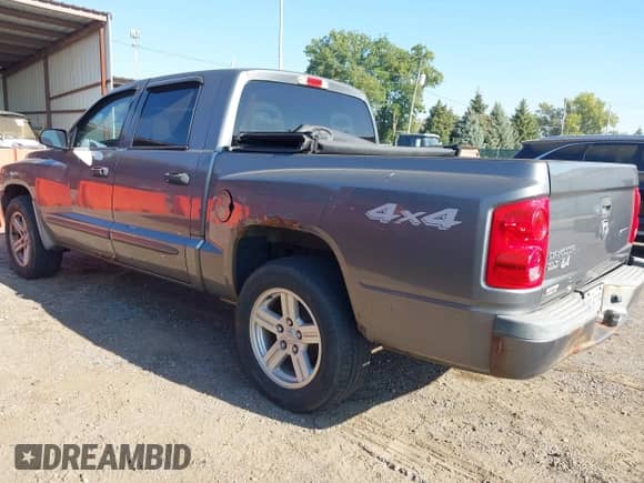 2007 Dodge Dakota SLT with VIN 1D7HW48K17S141534, listed as a IAAI auction lot 43202323 with 187,741 mi miles and . Bid and sale history available at DreamBid. Image 3.