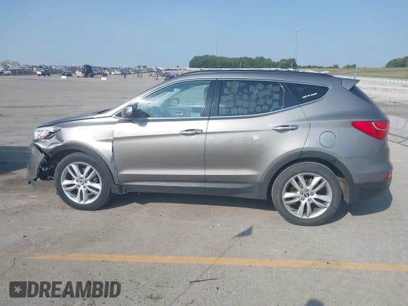 ✅ 2014 Hyundai Santa Fe • VIN: 5XYZU3LA5EG188677 • Lot: 43179416. Wystawiony na IAAI z przebiegiem 174 386 mil. Bezpłatny archiwum sprzedaży aukcyjnych z USA i szczegółowy raport historii pojazdu na DreamBid. Zdjęcie 14.