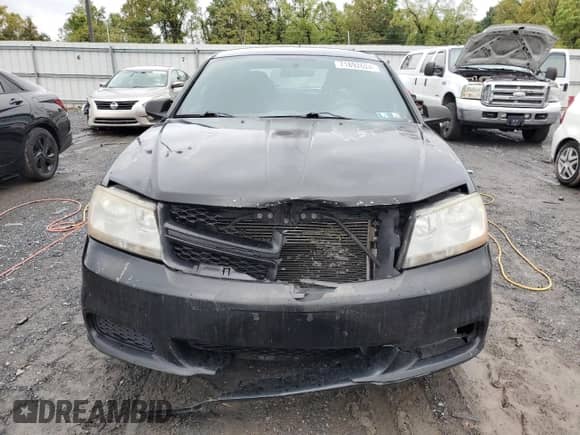 2013 Dodge Avenger SE с VIN 1C3CDZAB4DN589217, выставлен на аукционе Copart как лот 71892624 с пробегом 153 206 миль миль и Списание • Salvage title. История ставок и продаж доступна на DreamBid. Изображение 5.
