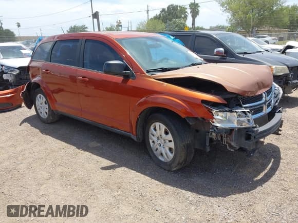 ✅ 2014 Dodge Journey American Value • VIN: 3C4PDCAB5ET152564 • Lot: 42864372. Listed on IAAI with 173,910 mi. Free auction sales archive from the USA and detailed vehicle history report at DreamBid. Image 1.