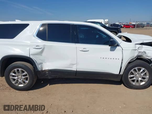 2019 Chevrolet Traverse LS with VIN 1GNERFKW5KJ121725, listed as a IAAI auction lot 43142189 with Not provided miles and . Bid and sale history available at DreamBid. Image 13.
