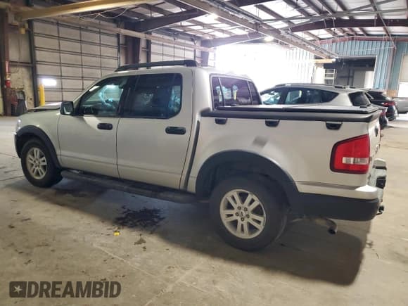 ✅ 2010 Ford Explorer Sport Trac XLT • VIN: 1FMEU5BE5AUF03013 • Лот: 67212825. Опубликован ранее на Copart с пробегом 129 668 миль. Бесплатный доступ к архиву аукционных продаж из США и подробный отчёт об истории автомобиля на DreamBid. Изображение 2.