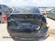 ✅ 2022 Tesla Model Y Long Range • VIN: 7SAYGDEE8NA004042 • Lot: 42941034. Wystawiony na IAAI z przebiegiem 35 769 mil. Bezpłatny archiwum sprzedaży aukcyjnych z USA i szczegółowy raport historii pojazdu na DreamBid. Zdjęcie 15.