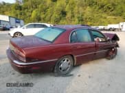 ✅ 1999 Buick Park Avenue Ultra • VIN: 1G4CU521XX4614556 • Лот: 70411104. Опубликован ранее на Copart с пробегом Не указан. Бесплатный доступ к архиву аукционных продаж из США и подробный отчёт об истории автомобиля на DreamBid. Изображение 3.