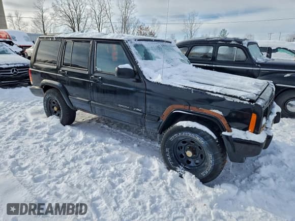 ✅ 1998 Jeep Cherokee Sport • VIN: 1J4FJ68S9WL150447 • Lot: 95184265. Listed on Copart with 231,976 mi. Free auction sales archive from the USA and detailed vehicle history report at DreamBid. Image 4.