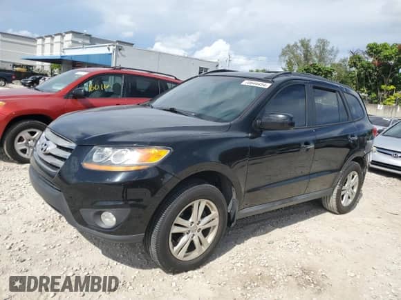 2012 Hyundai Santa Fe Limited с VIN 5XYZK4AG0CG164027, выставлен на аукционе Copart как лот 70644494 с пробегом 57 278 миль миль и Списание • Salvage title. История ставок и продаж доступна на DreamBid. Изображение 1.