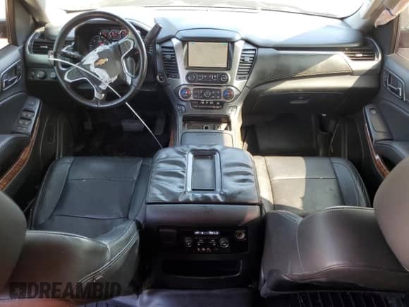 2015 Chevrolet Tahoe LTZ with VIN 1GNSKCKC6FR170659, listed as a Copart auction lot 69412835 with 252,198 mi miles and Salvage title. Bid and sale history available at DreamBid. Image 8.