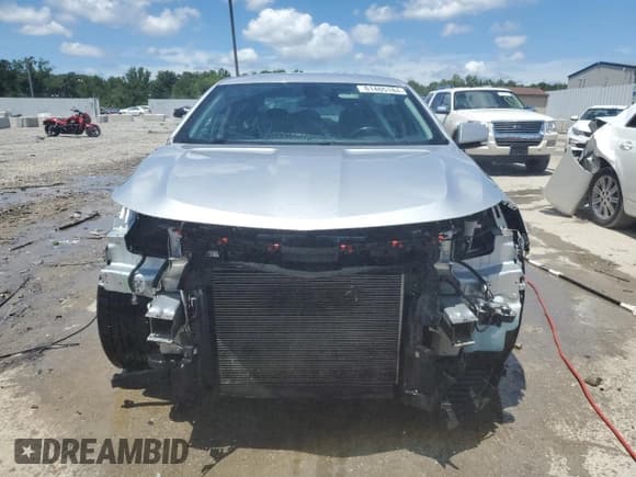 ✅ 2018 Chevrolet Impala LT • VIN: 2G1105SA0J9164033 • Лот: 61465184. Опубликован ранее на Copart с пробегом 104 208 миль. Бесплатный доступ к архиву аукционных продаж из США и подробный отчёт об истории автомобиля на DreamBid. Изображение 5.