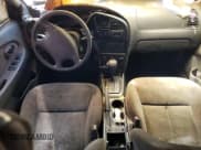 ✅ 2002 Kia Spectra • VIN: KNAFB121925119040 • Lot: 68853594. Listed on Copart with Not provided. Free auction sales archive from the USA and detailed vehicle history report at DreamBid. Image 8.