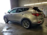 ✅ 2018 Hyundai Santa Fe 2.4L • VIN: 5NMZUDLB5JH069977 • Лот: 38550574. Опубликован ранее на Copart с пробегом 64 463 миль. Бесплатный доступ к архиву аукционных продаж из США и подробный отчёт об истории автомобиля на DreamBid. Изображение 2.