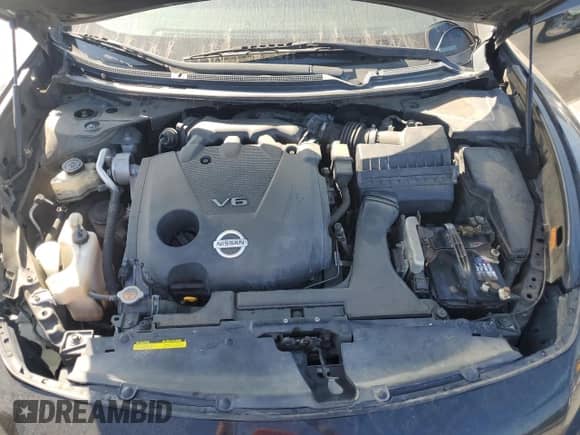 2012 Nissan Maxima S с VIN 1N4AA5AP5CC813191, выставлен на аукционе Copart как лот 80916265 с пробегом 118 418 миль миль и Списание • Salvage title. История ставок и продаж доступна на DreamBid. Изображение 11.