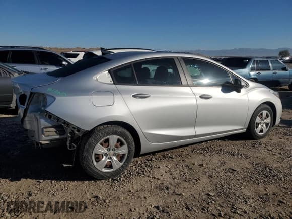 ✅ 2018 Chevrolet Cruze LS • VIN: 1G1BC5SM3J7203351 • Lot: 84962625. Listed on Copart with 56,771 mi. Free auction sales archive from the USA and detailed vehicle history report at DreamBid. Image 3.