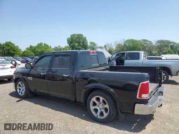 ✅ 2015 Ram 1500 Laramie • VIN: 1C6RR7NMXFS543314 • Lot: 60623445. Listed on Copart with 167,909 mi. Free auction sales archive from the USA and detailed vehicle history report at DreamBid. Image 2.