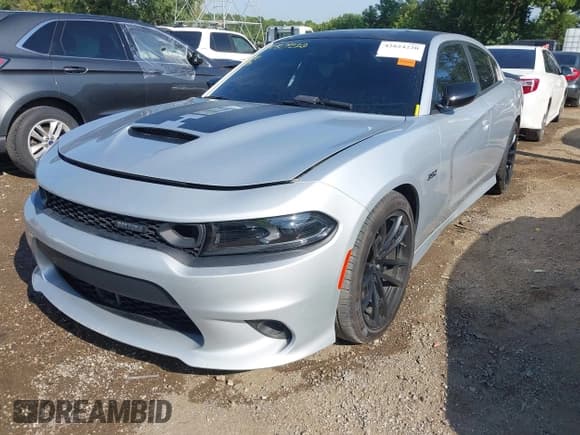 ✅ 2023 Dodge Charger Scat Pack Widebody • VIN: 2C3CDXGJ9PH699759 • Lot: 42824220. Listed on IAAI with 3,338 mi. Free auction sales archive from the USA and detailed vehicle history report at DreamBid. Image 2.