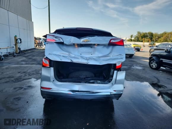 ✅ 2020 Chevrolet Equinox Premier • VIN: 2GNAXPEX3L6225370 • Lot: 93060535. Wystawiony na Copart z przebiegiem 98 412 mil. Bezpłatny archiwum sprzedaży aukcyjnych z USA i szczegółowy raport historii pojazdu na DreamBid. Zdjęcie 6.