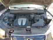 2011 Hyundai Santa Fe GLS z VIN 5XYZGDAG7BG019681, wystawiony jako Copart lot #67726714 z przebiegiem 175 070 mil mil oraz Szkoda całkowita • Salvage title. Historia ofert i sprzedaży dostępna na DreamBid. Obrazek 11.