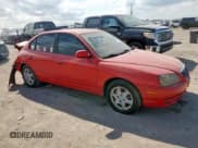 ✅ 2004 Hyundai Elantra GLS • VIN: KMHDN46D94U916934 • Lot: 91681385. Listed on Copart with 180,232 mi. Free auction sales archive from the USA and detailed vehicle history report at DreamBid. Image 4.