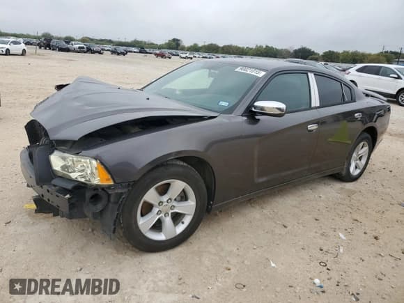 ✅ 2013 Dodge Charger SE • VIN: 2C3CDXBG8DH668509 • Lot: 90021015. Listed on Copart with 133,380 mi. Free auction sales archive from the USA and detailed vehicle history report at DreamBid. Image 1.