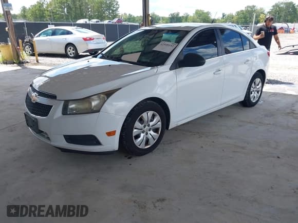 ✅ 2012 Chevrolet Cruze LS • VIN: 1G1PC5SH4C7155371 • Лот: 42948192. Опубликован ранее на IAAI с пробегом 143 376 миль. Бесплатный доступ к архиву аукционных продаж из США и подробный отчёт об истории автомобиля на DreamBid. Изображение 2.