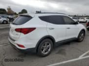 ✅ 2017 Hyundai Santa Fe 2.4L • VIN: 5NMZU3LB8HH026562 • Лот: 69805812. Опубликован ранее на Copart с пробегом 124 554 миль. Бесплатный доступ к архиву аукционных продаж из США и подробный отчёт об истории автомобиля на DreamBid. Изображение 3.
