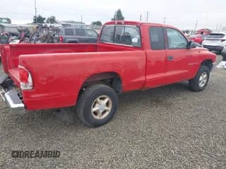 ✅ 1999 Dodge Dakota SLT • VIN: 1B7GG22X5XS216635 • Lot: 42570717. Wystawiony na IAAI z przebiegiem 243 087 mil. Bezpłatny archiwum sprzedaży aukcyjnych z USA i szczegółowy raport historii pojazdu na DreamBid. Zdjęcie 4.