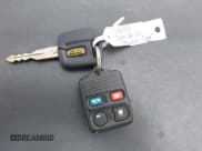 ✅ 1999 Lincoln Town Car Signature • VIN: 1LNFM82WXXY601583 • Lot: 42193270. Listed on IAAI with Not provided. Free auction sales archive from the USA and detailed vehicle history report at DreamBid. Image 11.