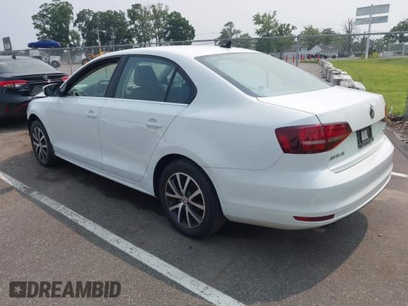 ✅ 2017 Volkswagen Jetta SE • VIN: 3VWB67AJ9HM233131 • Lot: 42895470. Listed on IAAI with 108,153 mi. Free auction sales archive from the USA and detailed vehicle history report at DreamBid. Image 3.