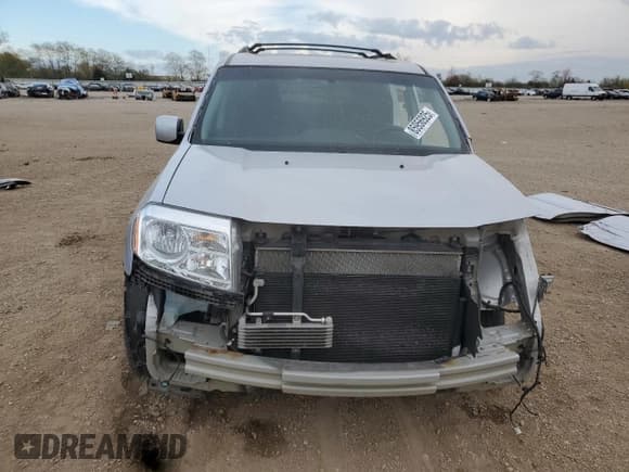 ✅ 2013 Honda Pilot EX-L • VIN: 5FNYF4H51DB057338 • Lot: 85956925. Listed on Copart with 127,562 mi. Free auction sales archive from the USA and detailed vehicle history report at DreamBid. Image 5.
