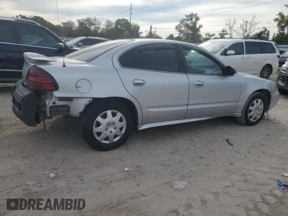 ✅ 2004 Pontiac Grand Am SE1 • VIN: 1G2NF52E24C141896 • Lot: 73159474. Listed on Copart with 99,294 mi. Free auction sales archive from the USA and detailed vehicle history report at DreamBid. Image 3.