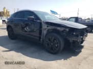 ✅ 2022 Mazda CX-30 2.5 Turbo • VIN: 3MVDMBAY6NM437882 • Lot: 64588415. Listed on Copart with 27,154 mi. Free auction sales archive from the USA and detailed vehicle history report at DreamBid. Image 4.