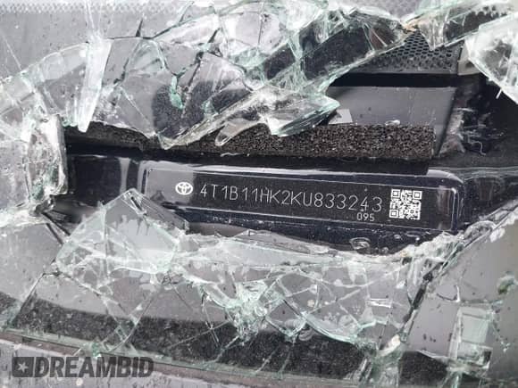 2019 Toyota Camry LE with VIN 4T1B11HK2KU833243, listed as a IAAI auction lot 42855313 with 128,404 mi miles and . Bid and sale history available at DreamBid. Image 9.