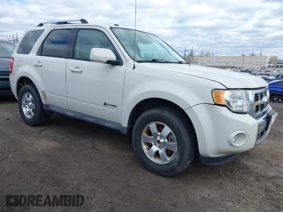 ✅ 2009 Ford Escape Hybrid • VIN: 1FMCU49379KD08964 • Lot: 42064656. Listed on IAAI with 133,536 mi. Free auction sales archive from the USA and detailed vehicle history report at DreamBid. Image 1.