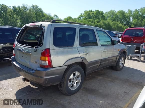 ✅ 2003 Mazda Tribute LX • VIN: 4F2YZ04113KM46727 • Лот: 42196041. Опубликован ранее на IAAI с пробегом Не указан. Бесплатный доступ к архиву аукционных продаж из США и подробный отчёт об истории автомобиля на DreamBid. Изображение 4.