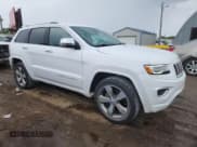 ✅ 2016 Jeep Grand Cherokee Overland • VIN: 1C4RJFCG5GC385029 • Lot: 80877655. Listed on Copart with 111,235 mi. Free auction sales archive from the USA and detailed vehicle history report at DreamBid. Image 4.