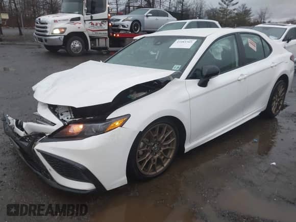 2023 Toyota Camry SE with VIN 4T1G11BK4PU094043, listed as a IAAI auction lot 41083305 with 25,698 mi miles and . Bid and sale history available at DreamBid. Image 2.
