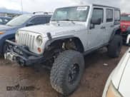 ✅ 2012 Jeep Wrangler Unlimited Call of Duty MW3 • VIN: 1C4BJWFG1CL108837 • Lot: 69850295. Listed on Copart with 123,224 mi. Free auction sales archive from the USA and detailed vehicle history report at DreamBid. Image 1.