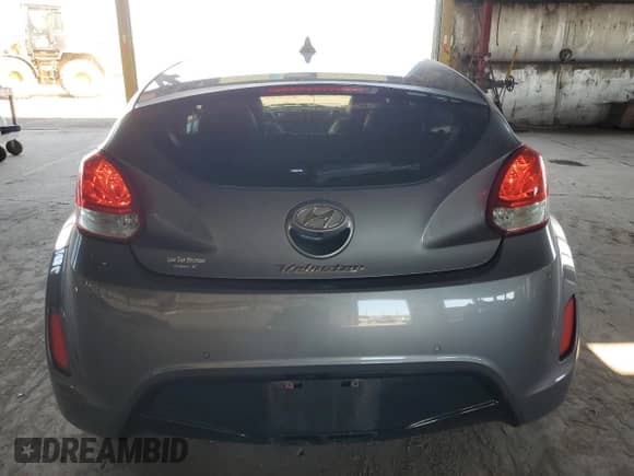 2015 Hyundai Veloster z VIN KMHTC6AD1FU232550, wystawiony jako Copart lot #69808314 z przebiegiem 97 915 mil mil oraz Szkoda całkowita • Salvage title. Historia ofert i sprzedaży dostępna na DreamBid. Obrazek 6.