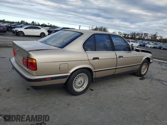 ✅ 1992 BMW 5 Series • VIN: WBAHD631XNBJ72799 • Lot: 91816185. Listed on Copart with 31,288 mi. Free auction sales archive from the USA and detailed vehicle history report at DreamBid. Image 3.