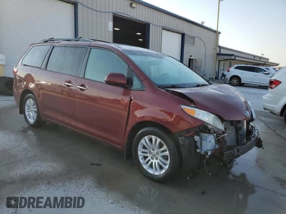 ✅ 2015 Toyota Sienna XLE • VIN: 5TDYK3DC5FS614857 • Lot: 86815405. Listed on Copart with 284,058 mi. Free auction sales archive from the USA and detailed vehicle history report at DreamBid. Image 4.