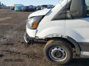 ✅ 2023 Ford Transit Cargo • VIN: 1FTBR1C8XPKB46362 • Lot: 41530807. Listed on IAAI with 46,779 mi. Free auction sales archive from the USA and detailed vehicle history report at DreamBid. Image 18.