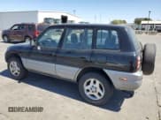 ✅ 2000 Toyota RAV4 • VIN: JT3HP10V2Y0235662 • Лот: 69881735. Опубликован ранее на Copart с пробегом 184 114 миль. Бесплатный доступ к архиву аукционных продаж из США и подробный отчёт об истории автомобиля на DreamBid. Изображение 2.