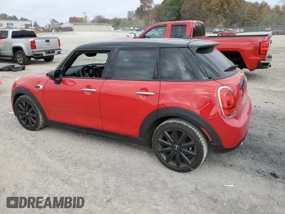 ✅ 2021 MINI Hardtop 4 Door Oxford Edition • VIN: WMWXU7C08M2N49721 • Lot: 77983324. Listed on Copart with 64,096 mi. Free auction sales archive from the USA and detailed vehicle history report at DreamBid. Image 2.