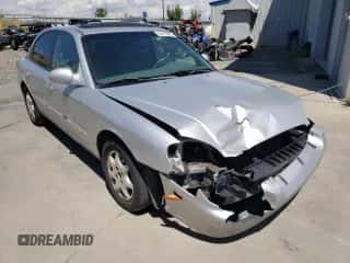 2001 Hyundai Sonata GLS с VIN KMHWF35V81A392523, выставлен на аукционе Copart как лот 74584334 с пробегом 174 597 миль миль и Списание • Salvage title. История ставок и продаж доступна на DreamBid. Изображение 4.