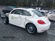 ✅ 2013 Volkswagen Beetle 2.5L • VIN: 3VWJP7AT7DM619969 • Lot: 43594617. Listed on IAAI with 10,181 mi. Free auction sales archive from the USA and detailed vehicle history report at DreamBid. Image 3.