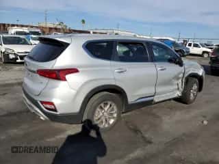 2019 Hyundai Santa Fe SE z VIN 5NMS2CAD2KH122836, wystawiony jako Copart lot #68588232 z przebiegiem 76 345 mil mil oraz . Historia ofert i sprzedaży dostępna na DreamBid. Obrazek 3.