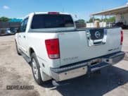 ✅ 2010 Nissan Titan SE • VIN: 1N6BA0ED4AN323907 • Lot: 42113512. Listed on IAAI with 198,530 mi. Free auction sales archive from the USA and detailed vehicle history report at DreamBid. Image 3.