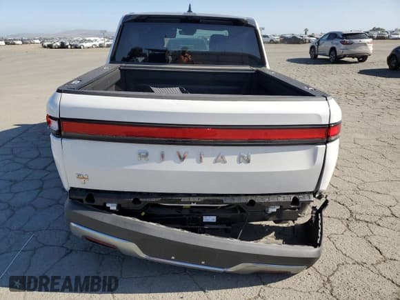 ✅ 2022 Rivian R1T Adventure • VIN: 7FCTGAAA9NN009189 • Lot: 56009235. Wystawiony na Copart z przebiegiem 28 994 mil. Bezpłatny archiwum sprzedaży aukcyjnych z USA i szczegółowy raport historii pojazdu na DreamBid. Zdjęcie 6.