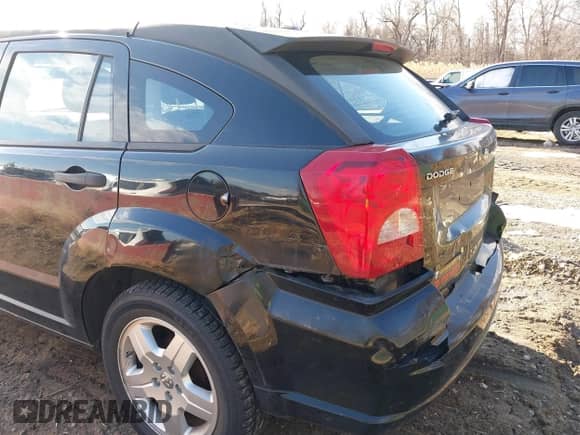 2012 Dodge Caliber SE z VIN 1C3CDWBA3CD506580, wystawiony jako IAAI lot #41435322 z przebiegiem 108 385 mil mil oraz . Historia ofert i sprzedaży dostępna na DreamBid. Obrazek 6.