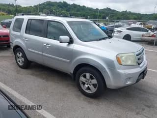 ✅ 2010 Honda Pilot EX-L • VIN: 5FNYF4H57AB037008 • Lot: 42779515. Wystawiony na IAAI z przebiegiem 392 287 mil. Bezpłatny archiwum sprzedaży aukcyjnych z USA i szczegółowy raport historii pojazdu na DreamBid. Zdjęcie 1.