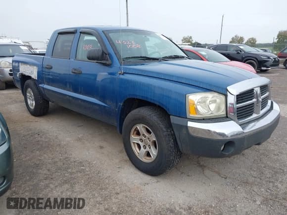 ✅ 2005 Dodge Dakota SLT • VIN: 1D7HW48N45S269497 • Lot: 43231008. Listed on IAAI with 375,174 mi. Free auction sales archive from the USA and detailed vehicle history report at DreamBid. Image 1.